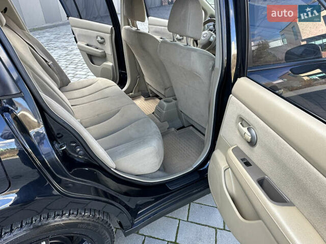 Черный Ниссан Тиида, объемом двигателя 1.6 л и пробегом 169 тыс. км за 6200 $, фото 14 на Automoto.ua