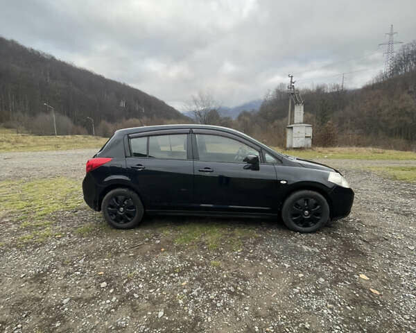 Черный Ниссан Тиида, объемом двигателя 1.6 л и пробегом 138 тыс. км за 6400 $, фото 16 на Automoto.ua