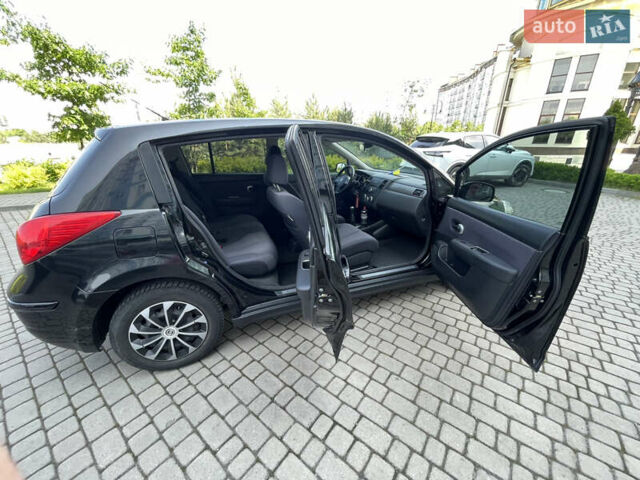 Черный Ниссан Тиида, объемом двигателя 1.8 л и пробегом 140 тыс. км за 6700 $, фото 12 на Automoto.ua