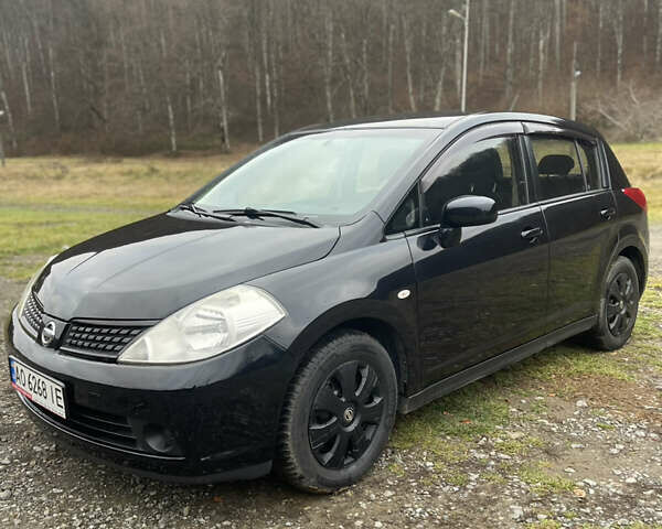 Черный Ниссан Тиида, объемом двигателя 1.6 л и пробегом 138 тыс. км за 6400 $, фото 5 на Automoto.ua