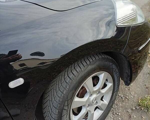 Черный Ниссан Тиида, объемом двигателя 1.6 л и пробегом 240 тыс. км за 7900 $, фото 9 на Automoto.ua