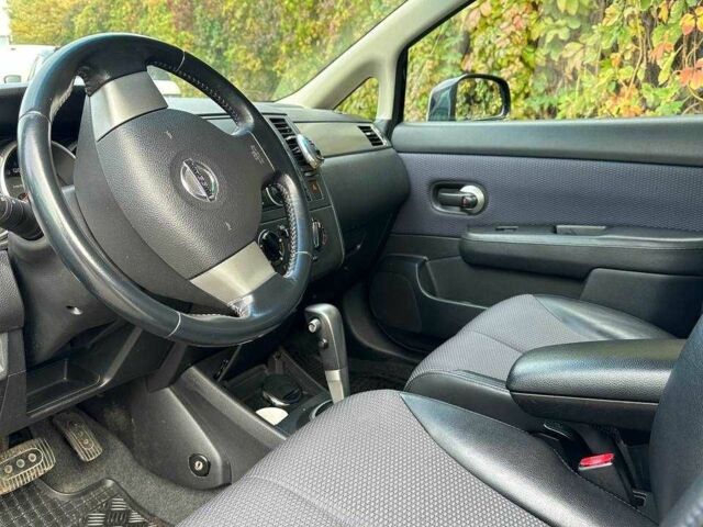 Черный Ниссан Тиида, объемом двигателя 1.6 л и пробегом 117 тыс. км за 7400 $, фото 10 на Automoto.ua