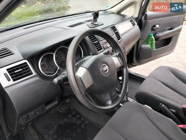 Чорний Ніссан Тііда, об'ємом двигуна 1.6 л та пробігом 114 тис. км за 6729 $, фото 28 на Automoto.ua