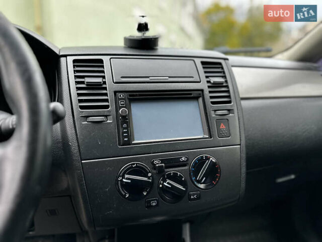 Чорний Ніссан Тііда, об'ємом двигуна 1.6 л та пробігом 179 тис. км за 5500 $, фото 7 на Automoto.ua