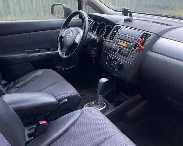 Черный Ниссан Тиида, объемом двигателя 1.6 л и пробегом 188 тыс. км за 6700 $, фото 15 на Automoto.ua