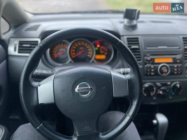 Черный Ниссан Тиида, объемом двигателя 1.6 л и пробегом 188 тыс. км за 6700 $, фото 6 на Automoto.ua
