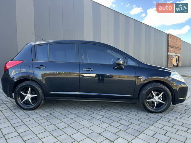 Черный Ниссан Тиида, объемом двигателя 1.6 л и пробегом 169 тыс. км за 6200 $, фото 4 на Automoto.ua