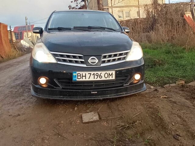 Черный Ниссан Тиида, объемом двигателя 1.5 л и пробегом 120 тыс. км за 6000 $, фото 4 на Automoto.ua
