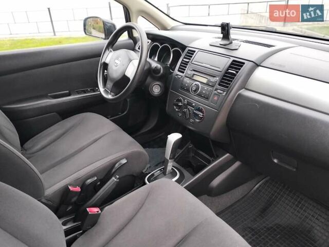 Черный Ниссан Тиида, объемом двигателя 1.6 л и пробегом 114 тыс. км за 6900 $, фото 35 на Automoto.ua