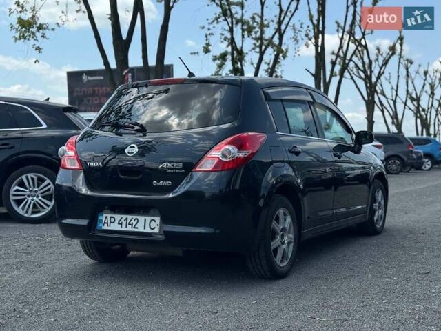 Черный Ниссан Тиида, объемом двигателя 1.49 л и пробегом 152 тыс. км за 8000 $, фото 5 на Automoto.ua