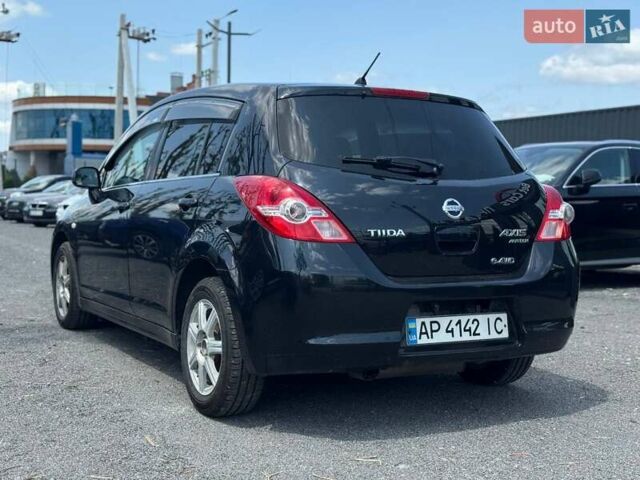 Черный Ниссан Тиида, объемом двигателя 1.49 л и пробегом 152 тыс. км за 8000 $, фото 2 на Automoto.ua