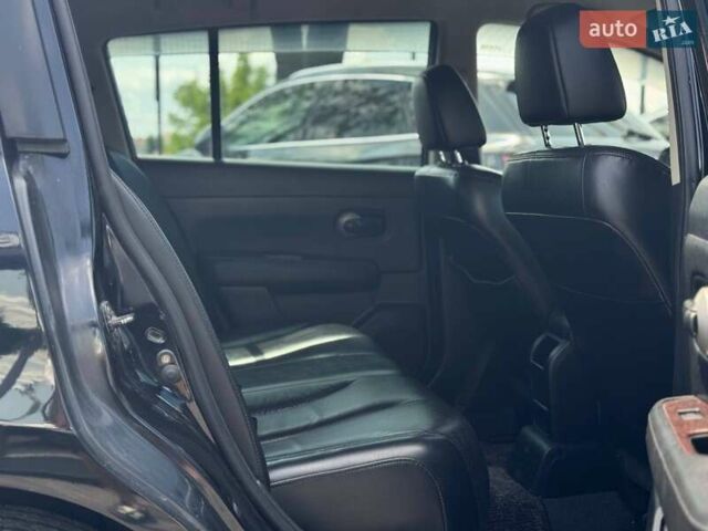 Черный Ниссан Тиида, объемом двигателя 1.49 л и пробегом 152 тыс. км за 8000 $, фото 19 на Automoto.ua
