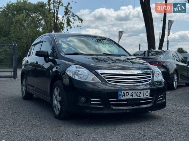 Черный Ниссан Тиида, объемом двигателя 1.49 л и пробегом 152 тыс. км за 8000 $, фото 6 на Automoto.ua