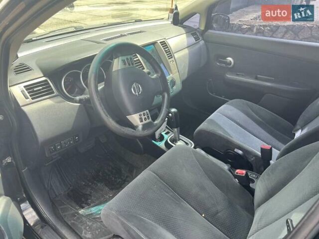 Черный Ниссан Тиида, объемом двигателя 1.6 л и пробегом 237 тыс. км за 6199 $, фото 1 на Automoto.ua