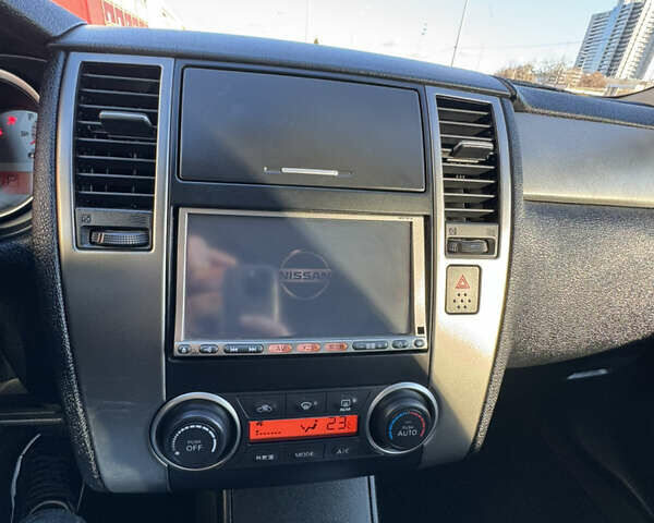 Черный Ниссан Тиида, объемом двигателя 1.5 л и пробегом 30 тыс. км за 7800 $, фото 18 на Automoto.ua