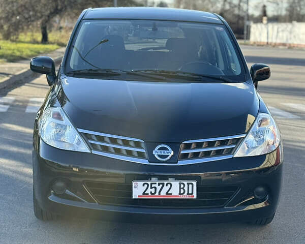 Черный Ниссан Тиида, объемом двигателя 1.5 л и пробегом 30 тыс. км за 7800 $, фото 7 на Automoto.ua