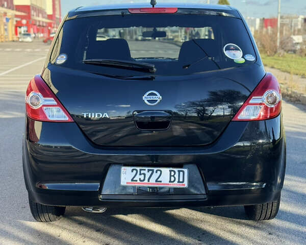 Черный Ниссан Тиида, объемом двигателя 1.5 л и пробегом 30 тыс. км за 7800 $, фото 1 на Automoto.ua