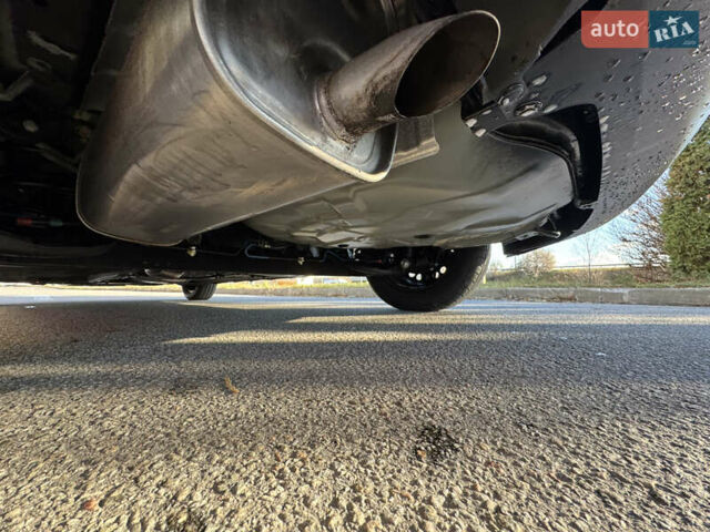 Черный Ниссан Тиида, объемом двигателя 1.5 л и пробегом 30 тыс. км за 7800 $, фото 27 на Automoto.ua