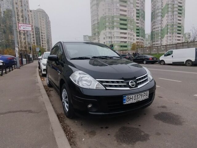 Черный Ниссан Тиида, объемом двигателя 1.5 л и пробегом 51 тыс. км за 7300 $, фото 1 на Automoto.ua