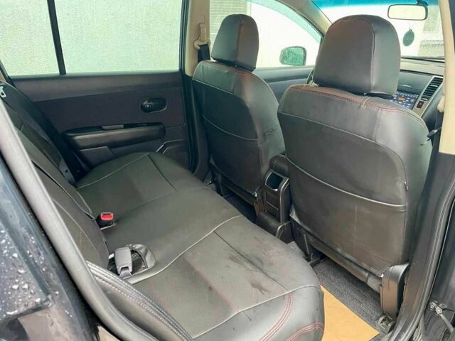 Черный Ниссан Тиида, объемом двигателя 1.5 л и пробегом 102 тыс. км за 7400 $, фото 11 на Automoto.ua