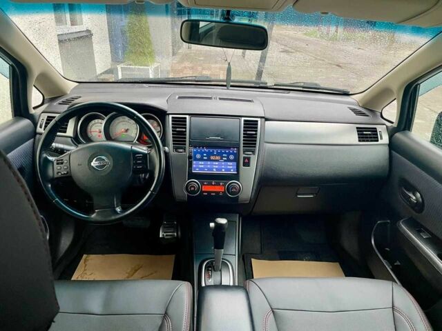 Черный Ниссан Тиида, объемом двигателя 1.5 л и пробегом 102 тыс. км за 7400 $, фото 7 на Automoto.ua