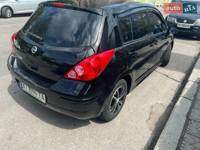 Черный Ниссан Тиида, объемом двигателя 1.6 л и пробегом 237 тыс. км за 6199 $, фото 6 на Automoto.ua