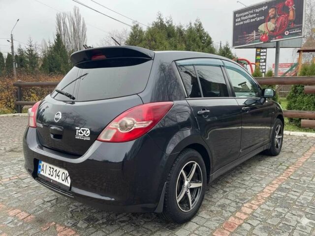 Черный Ниссан Тиида, объемом двигателя 1.5 л и пробегом 102 тыс. км за 7400 $, фото 2 на Automoto.ua