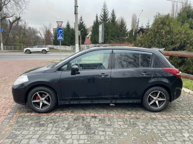 Черный Ниссан Тиида, объемом двигателя 1.5 л и пробегом 102 тыс. км за 7400 $, фото 4 на Automoto.ua