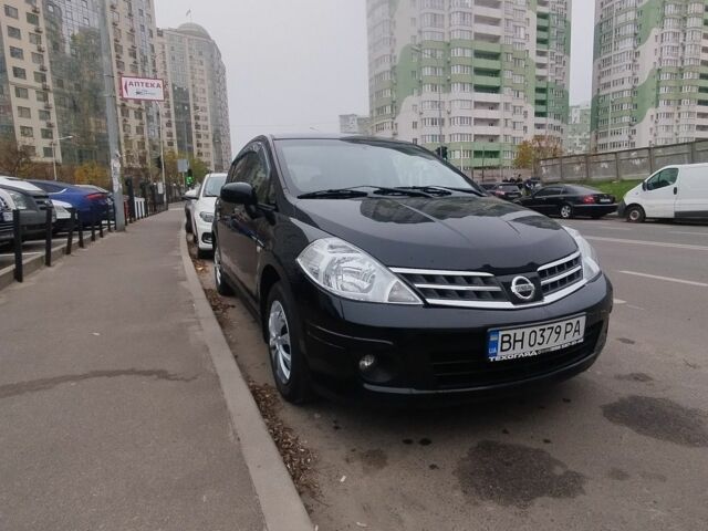 Черный Ниссан Тиида, объемом двигателя 1.5 л и пробегом 51 тыс. км за 7300 $, фото 6 на Automoto.ua