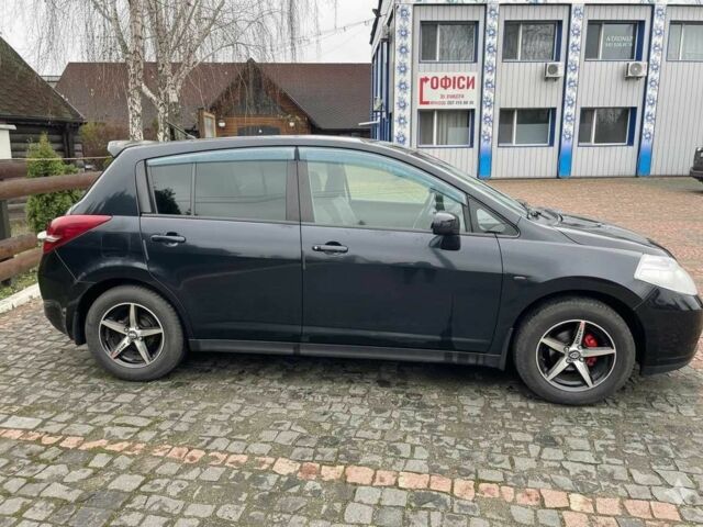 Черный Ниссан Тиида, объемом двигателя 1.5 л и пробегом 102 тыс. км за 7400 $, фото 1 на Automoto.ua
