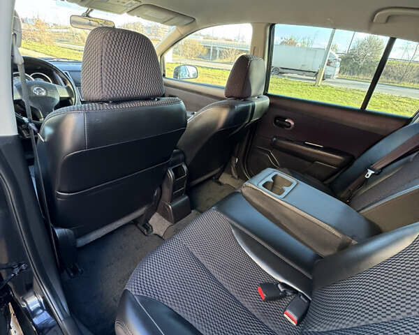 Черный Ниссан Тиида, объемом двигателя 1.5 л и пробегом 30 тыс. км за 7800 $, фото 13 на Automoto.ua