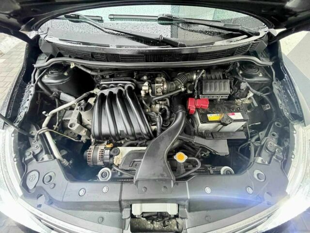 Черный Ниссан Тиида, объемом двигателя 1.5 л и пробегом 102 тыс. км за 7400 $, фото 12 на Automoto.ua