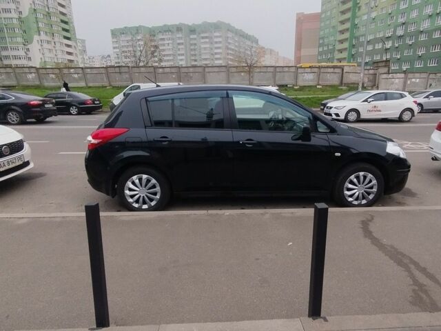 Черный Ниссан Тиида, объемом двигателя 1.5 л и пробегом 51 тыс. км за 7300 $, фото 2 на Automoto.ua