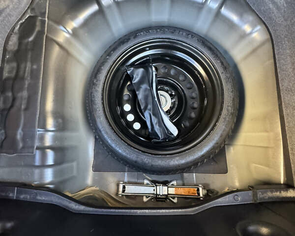 Черный Ниссан Тиида, объемом двигателя 1.5 л и пробегом 30 тыс. км за 7800 $, фото 20 на Automoto.ua