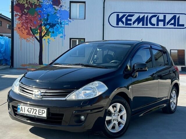 Черный Ниссан Тиида, объемом двигателя 1.6 л и пробегом 181 тыс. км за 6999 $, фото 1 на Automoto.ua