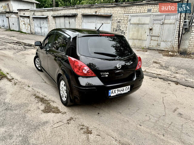 Черный Ниссан Тиида, объемом двигателя 1.6 л и пробегом 95 тыс. км за 10200 $, фото 4 на Automoto.ua