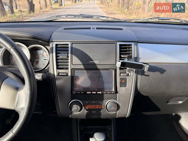 Чорний Ніссан Тііда, об'ємом двигуна 1.5 л та пробігом 79 тис. км за 7600 $, фото 42 на Automoto.ua