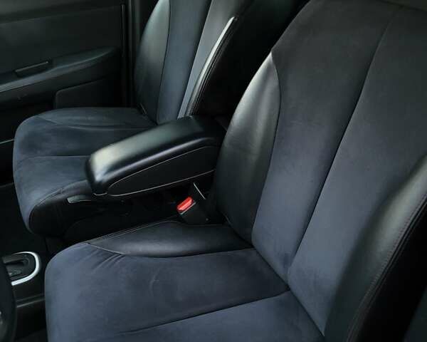 Черный Ниссан Тиида, объемом двигателя 1.5 л и пробегом 95 тыс. км за 8350 $, фото 17 на Automoto.ua