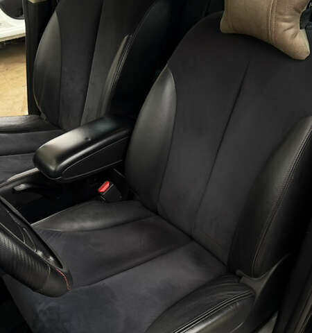 Чорний Ніссан Тііда, об'ємом двигуна 1.5 л та пробігом 94 тис. км за 7000 $, фото 49 на Automoto.ua