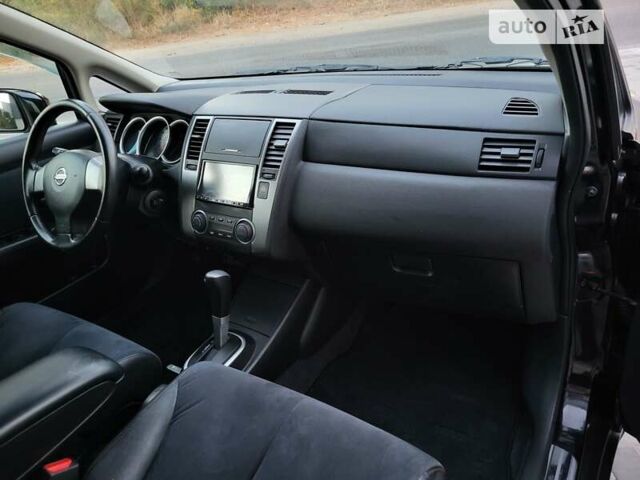 Чорний Ніссан Тііда, об'ємом двигуна 1.5 л та пробігом 95 тис. км за 7999 $, фото 10 на Automoto.ua