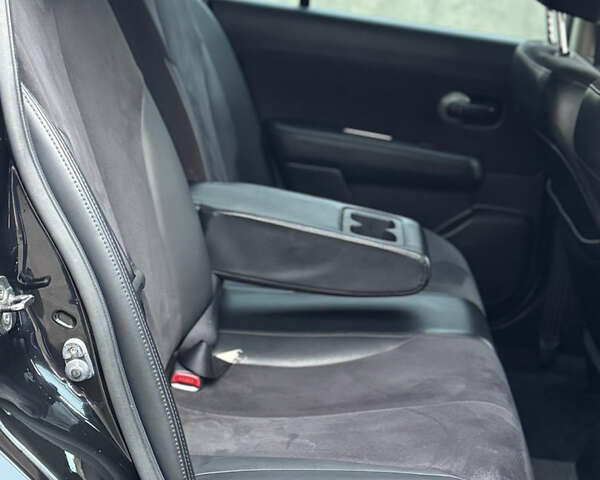 Черный Ниссан Тиида, объемом двигателя 1.5 л и пробегом 95 тыс. км за 8350 $, фото 18 на Automoto.ua