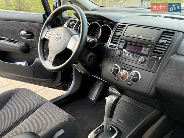 Черный Ниссан Тиида, объемом двигателя 1.6 л и пробегом 60 тыс. км за 9999 $, фото 46 на Automoto.ua