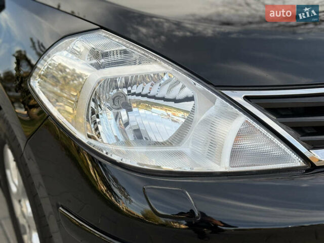 Черный Ниссан Тиида, объемом двигателя 1.6 л и пробегом 60 тыс. км за 9999 $, фото 22 на Automoto.ua