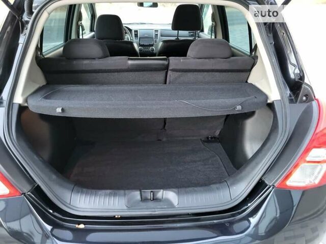 Черный Ниссан Тиида, объемом двигателя 1.5 л и пробегом 95 тыс. км за 8350 $, фото 32 на Automoto.ua