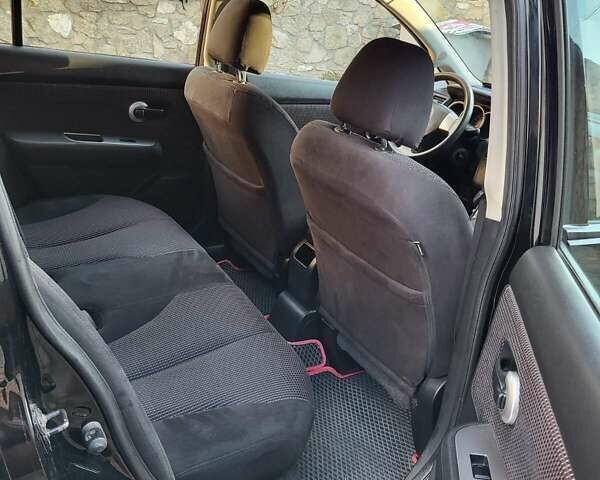 Черный Ниссан Тиида, объемом двигателя 1.6 л и пробегом 99 тыс. км за 7500 $, фото 3 на Automoto.ua