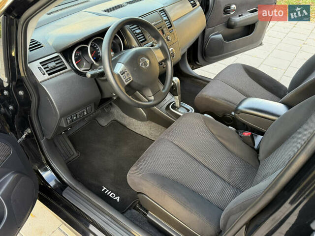 Черный Ниссан Тиида, объемом двигателя 1.6 л и пробегом 60 тыс. км за 9999 $, фото 51 на Automoto.ua