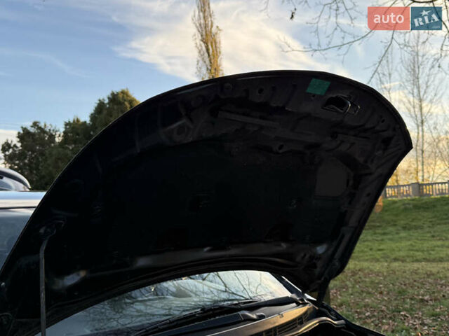 Черный Ниссан Тиида, объемом двигателя 1.6 л и пробегом 60 тыс. км за 9999 $, фото 82 на Automoto.ua