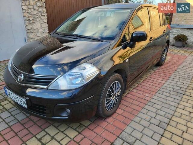 Черный Ниссан Тиида, объемом двигателя 1.6 л и пробегом 99 тыс. км за 7500 $, фото 2 на Automoto.ua