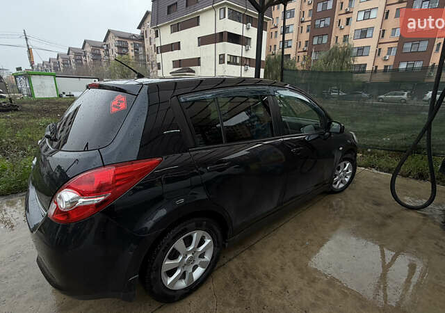 Чорний Ніссан Тііда, об'ємом двигуна 1.5 л та пробігом 94 тис. км за 7000 $, фото 3 на Automoto.ua