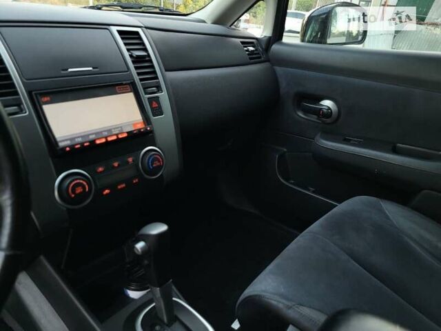 Черный Ниссан Тиида, объемом двигателя 1.5 л и пробегом 95 тыс. км за 8350 $, фото 23 на Automoto.ua